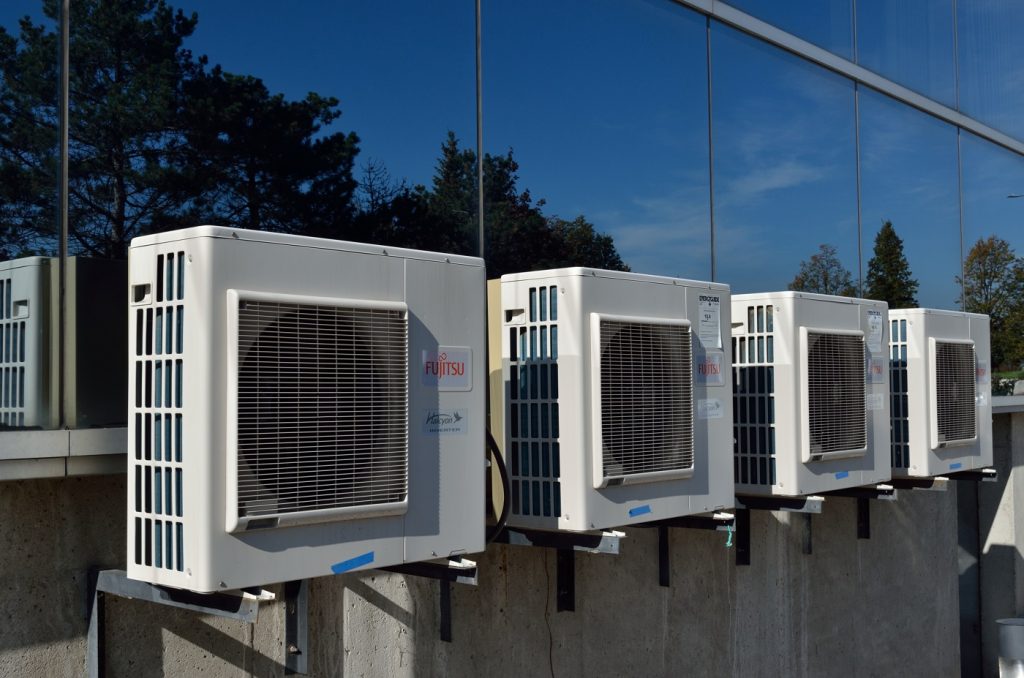 Hvac system on top of building - green hvac technologies to reduce carbon emissions