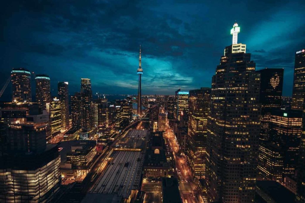 Toronto skyline at night - ways toronto residents can contribute to ongoing green efforts