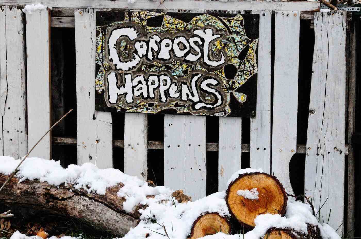"compost happens" sign on fence - 11 diy building projects for a greener home
