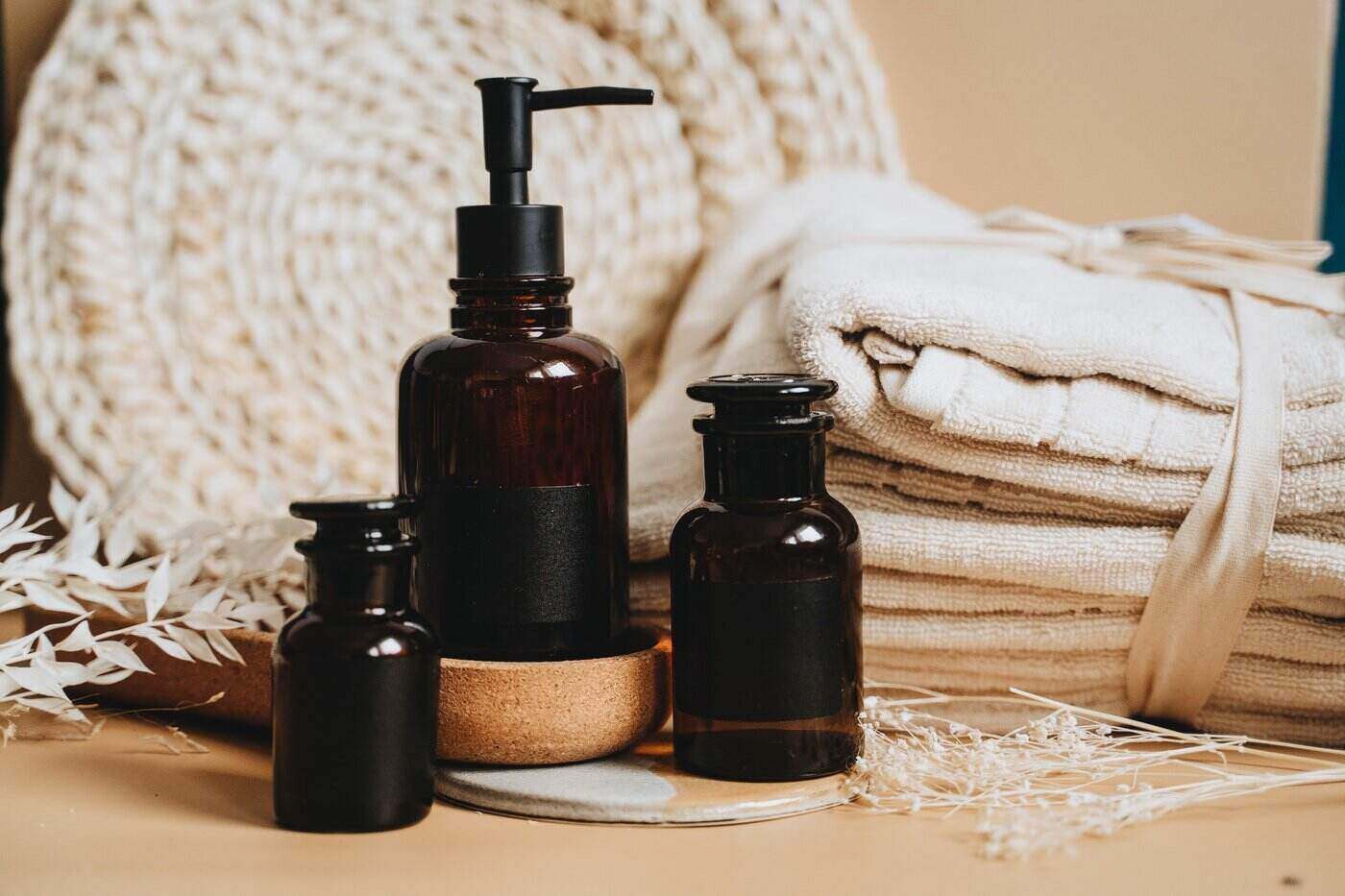 9 Simple Decluttering Tips That Are Both Effective And Eco-Friendly 4 Lotion bottles and towels - simple decluttering tips that are both effective and eco-friendly