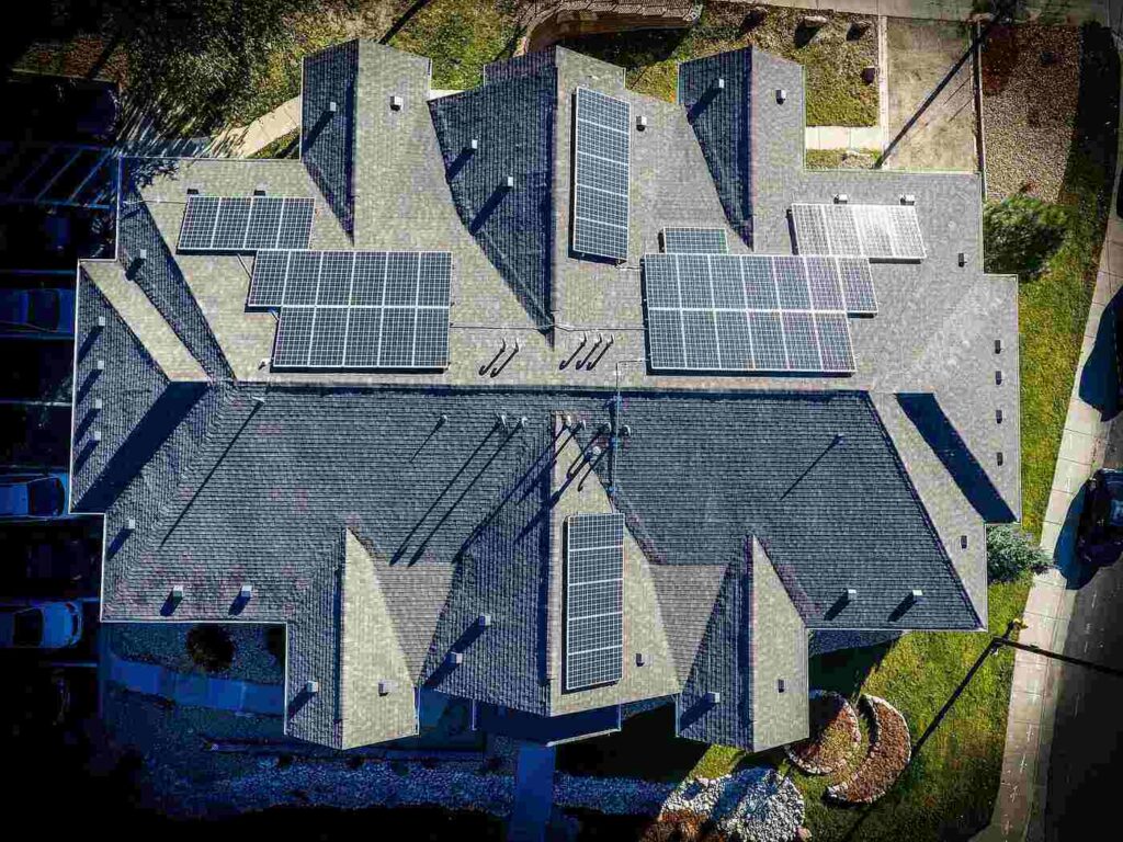 Aerial view of rooftop with solar panels - 7 easy steps to make your roof solar panel ready