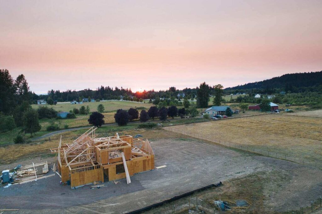 Rural home under construction - will measuring carbon use intensity help the building sector get to net zero