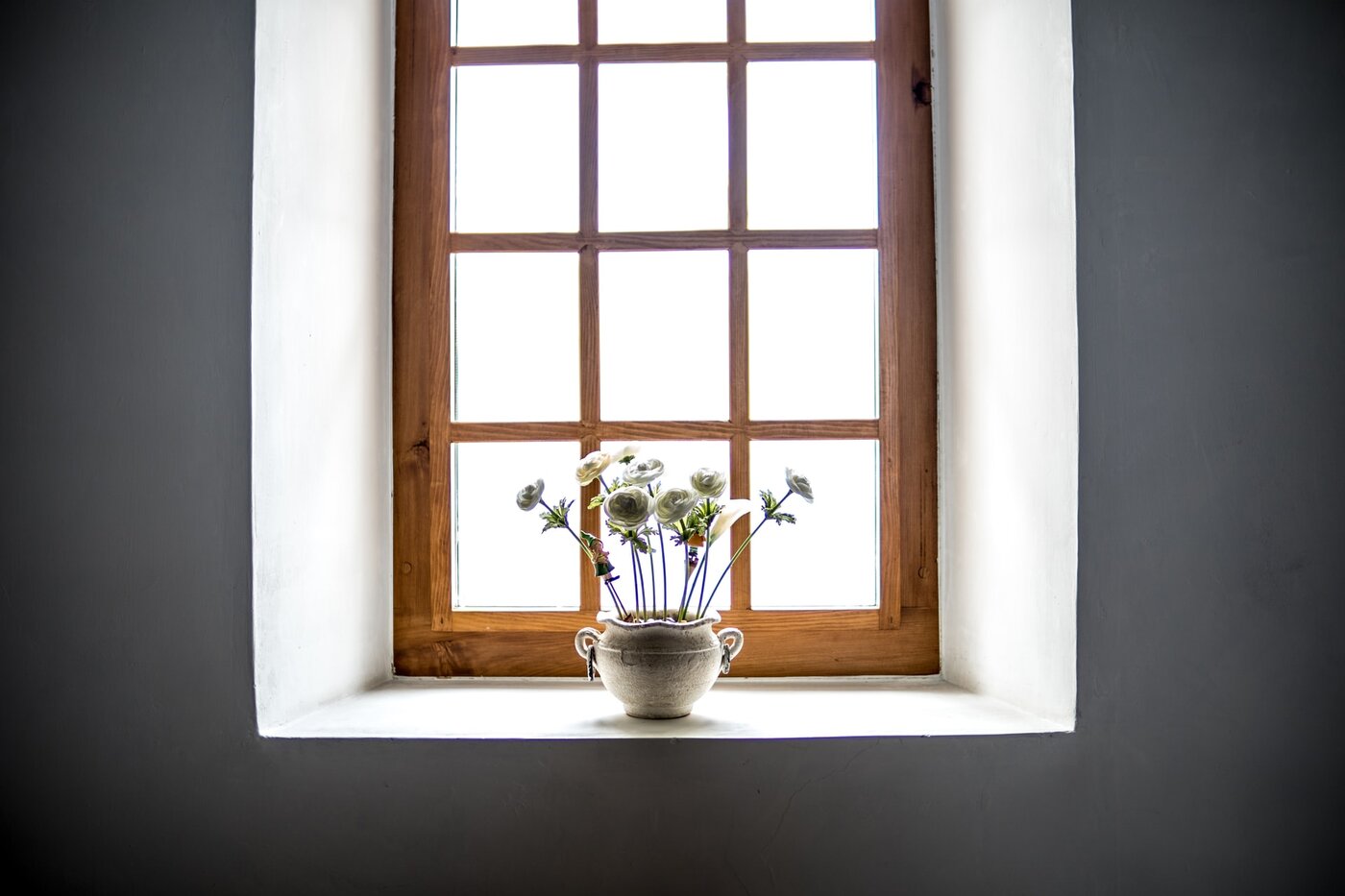 6 Great Tricks For A Green Basement Renovation 4 Basement window with vase of flowers - 6 great tricks for a green basement renovation
