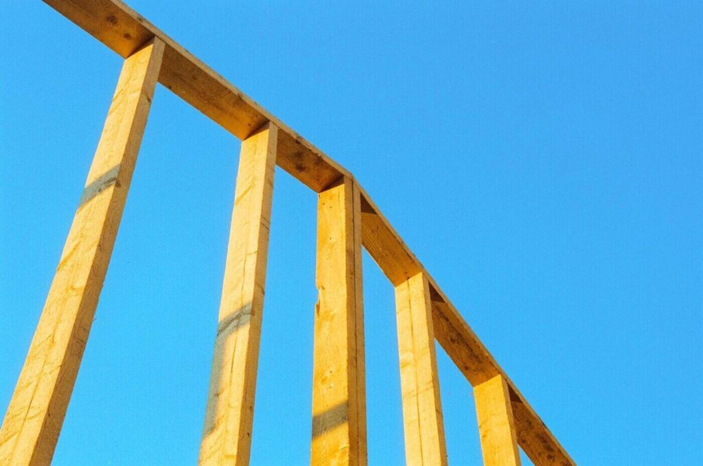 Framed wall against sky - how to be more environmentally friendly while building a house