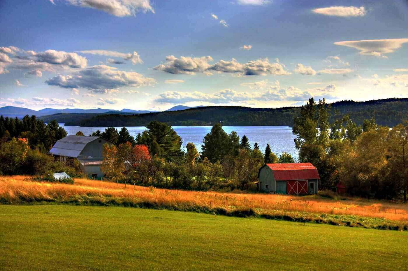 Expansion To Lac-Mégantic Microgrid Helps Town Build Back Sustainably 2 View of farmhouse and lac mégantic - expansion to lac megantic microgrid