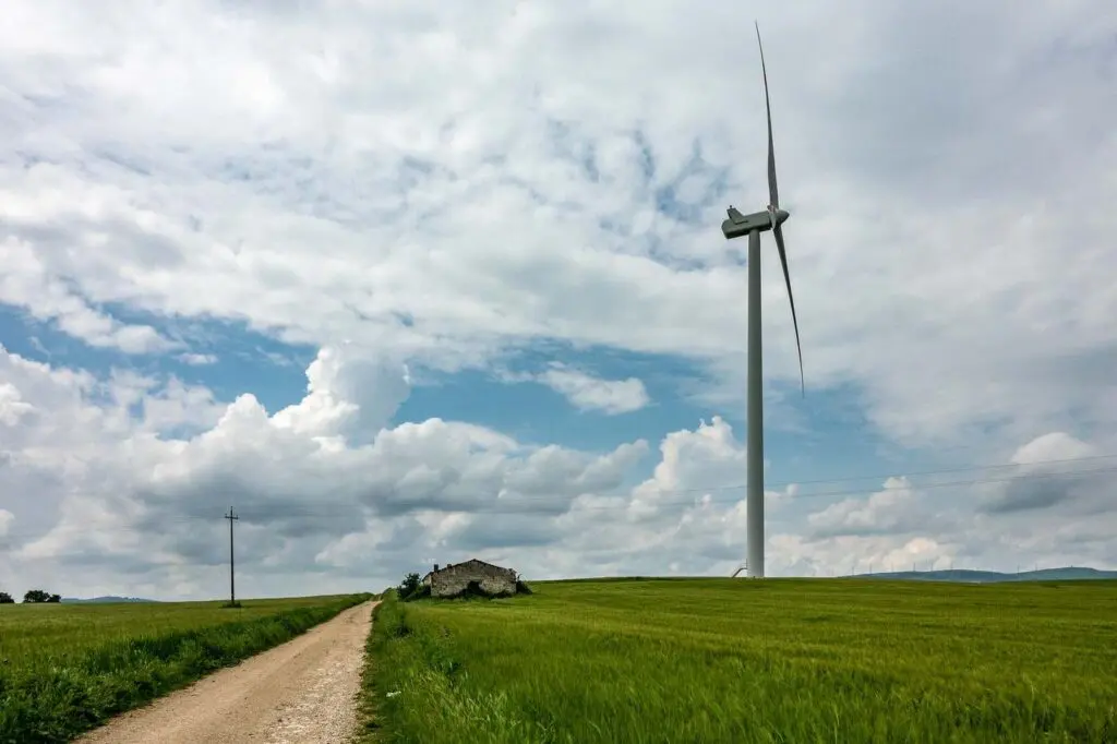 Wind turbine by outbuilding - is a wind turbine right for your rural property