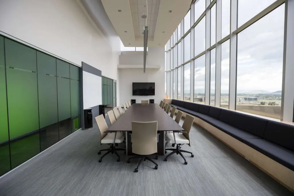 Meeting room with large windows - sustainable office security