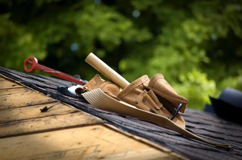Tool belt on roof - building methods and environmental emissions
