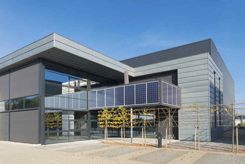 What Commercial Solar Panels Cost In Canada In 2026 4 Solar panels on wall office building facade