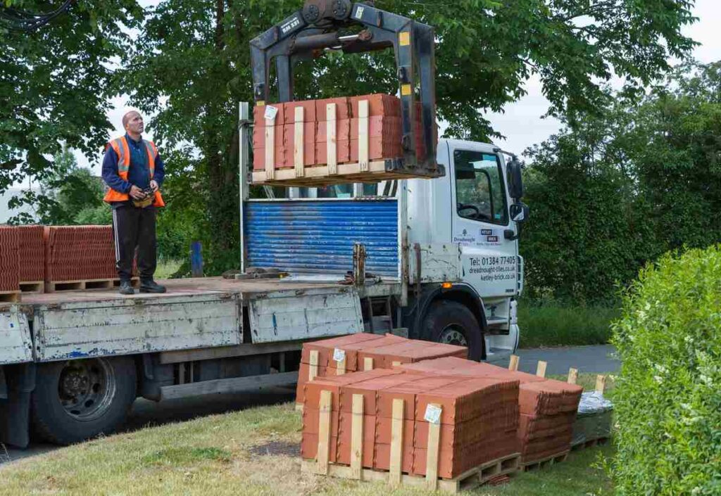 How Building Companies Can Audit Their Logistics Operations For Environmental Performance 4 Building supplies bricks truck delivery