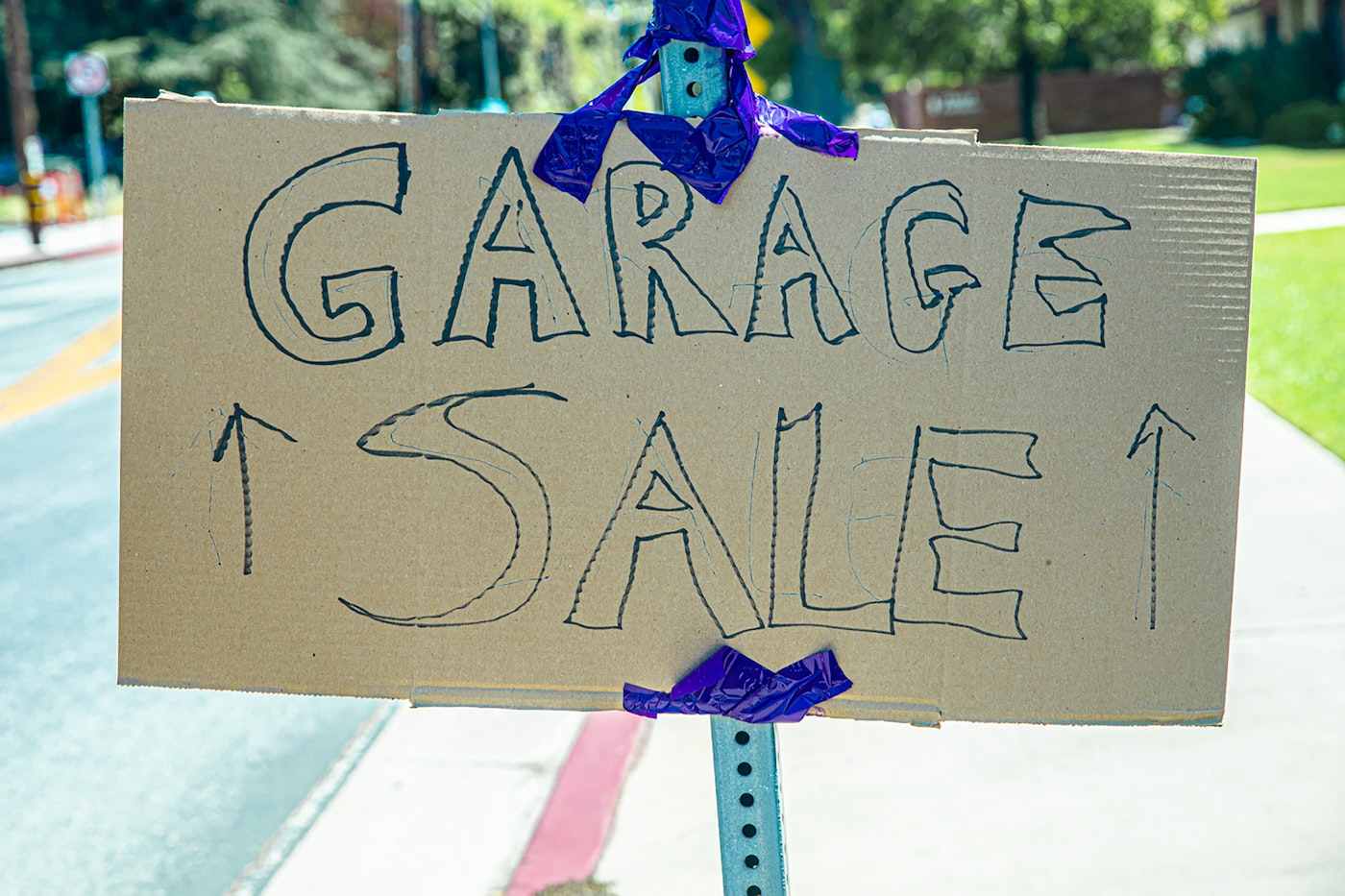 Garage sale sign - where to find recycled building materials to build a house